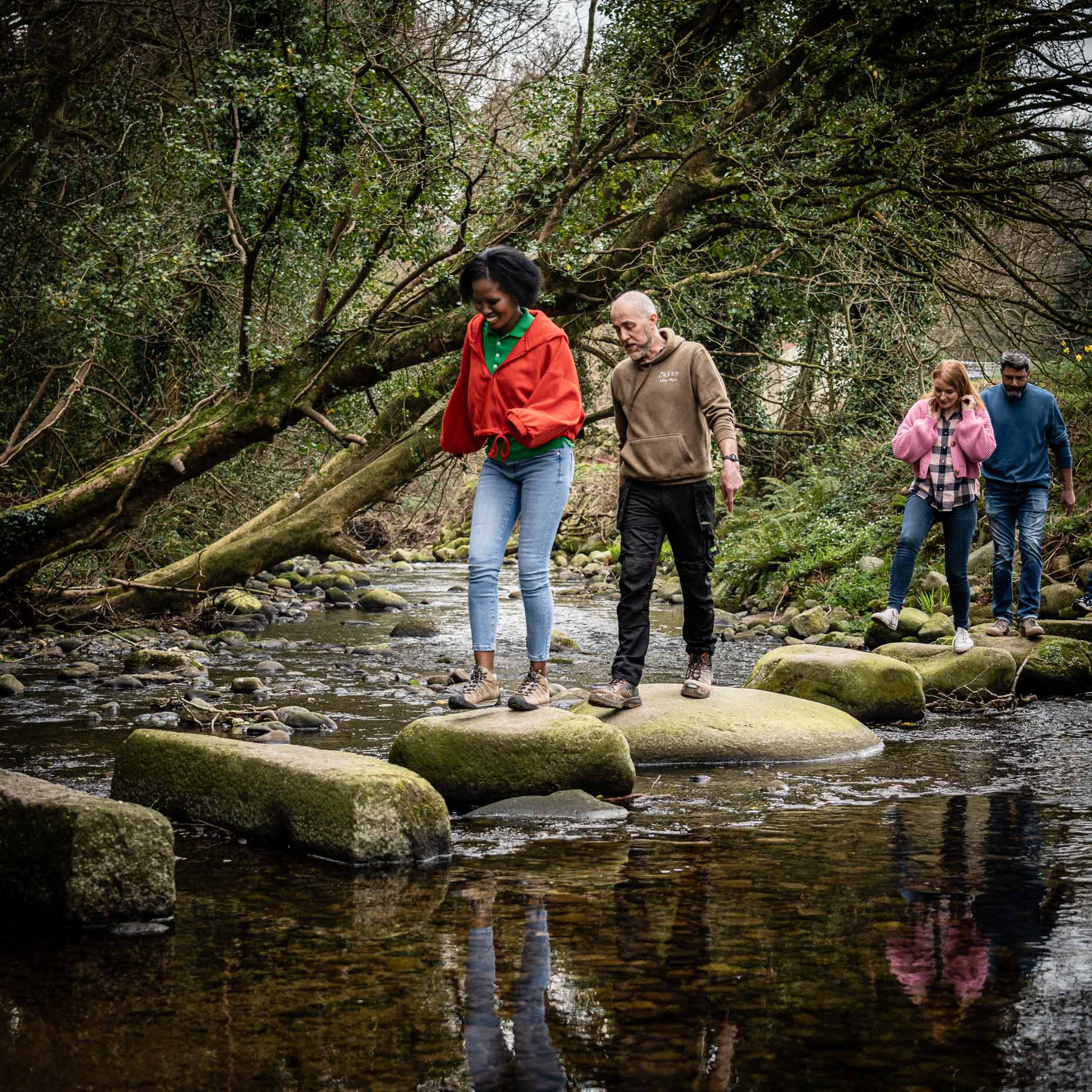 Crossing a river on some stepping stones, Northern Ireland