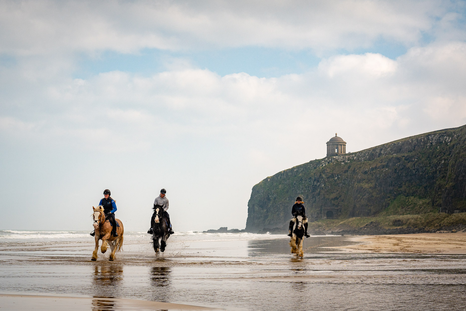 Horse riding on Downhill Beach, Northern Ireland